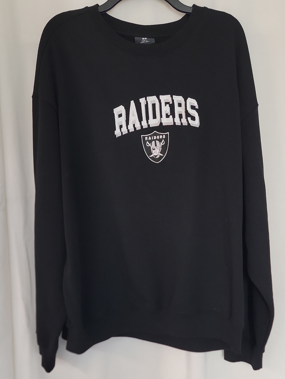 H&M Black Crewneck Sweatshirt with White Raiders Logo